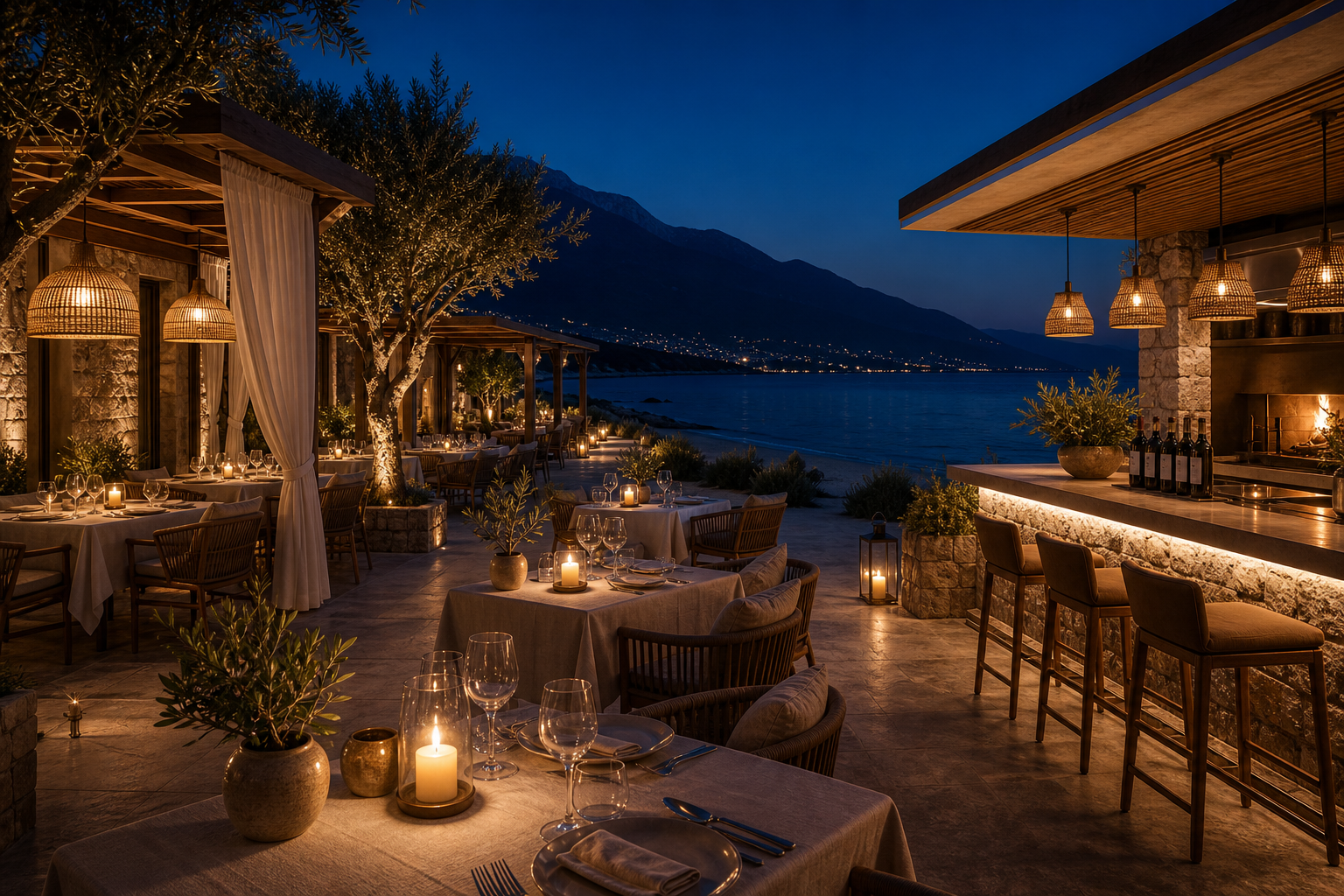 Empty night beach dining and wine terrace by the Aegean Sea